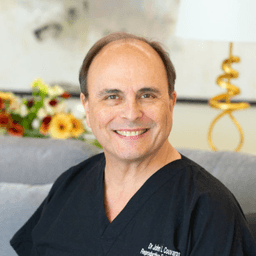 Dr. John L. Couvaras, MD, FACOG